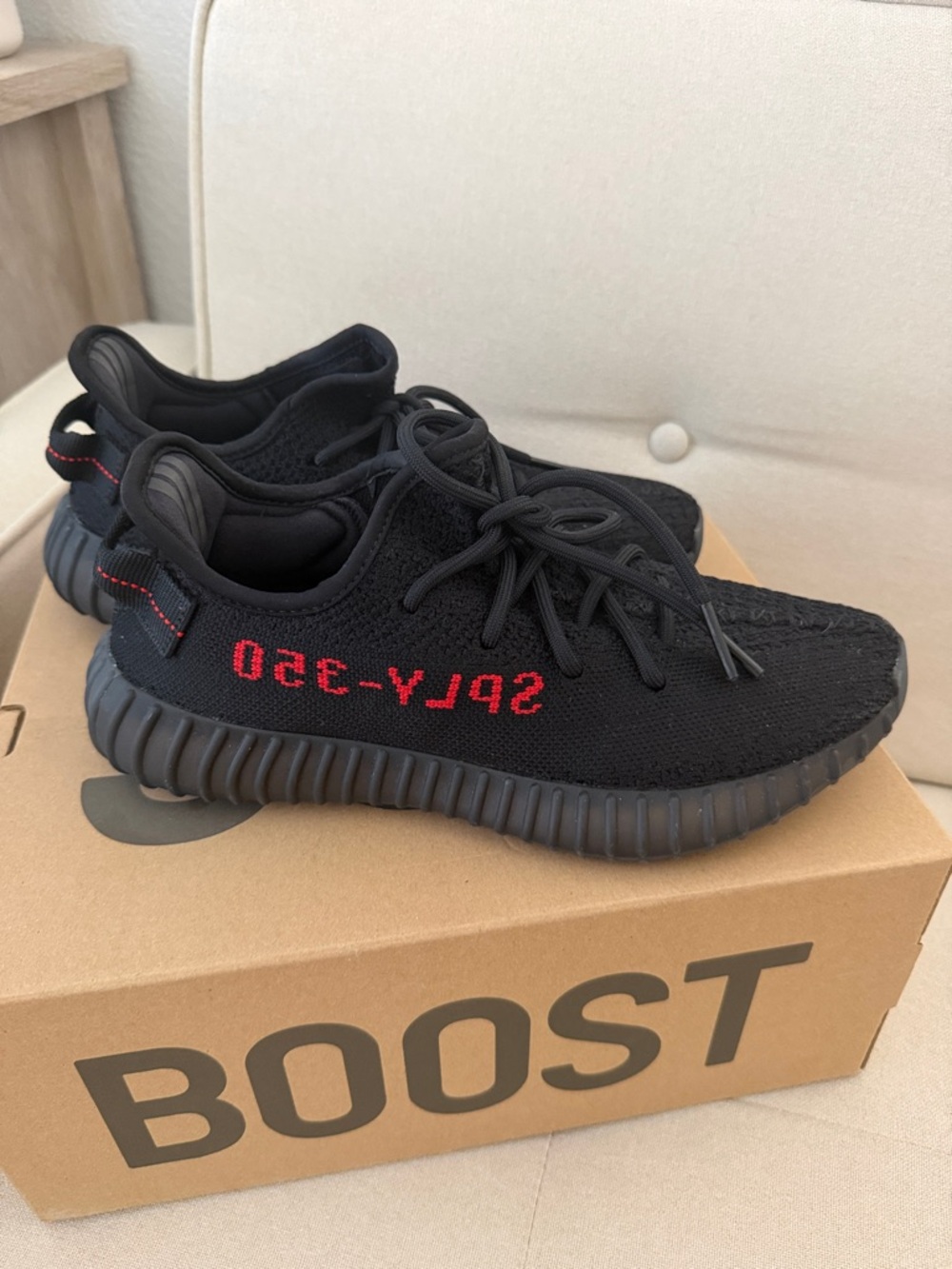 adidas Kids Black Sneakers with Red Stripe Detail